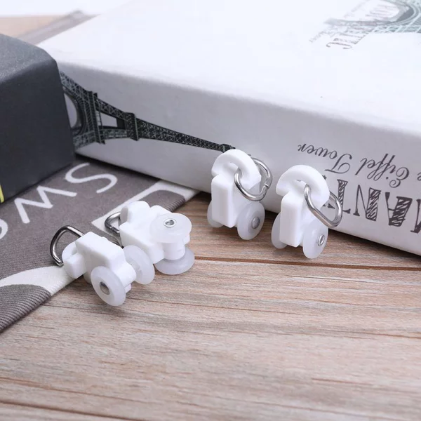 Ролики (бігунки) для електрокарниза